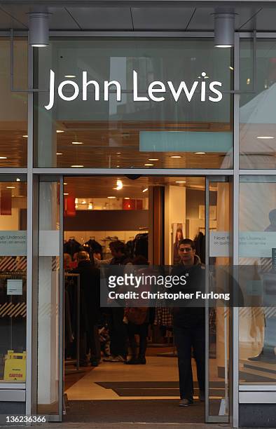 Shoppers take advantage of the post Christmas sales outside the Liverpool branch of John Lewis on December 29, 2011 in Liverpool, England. In spite...