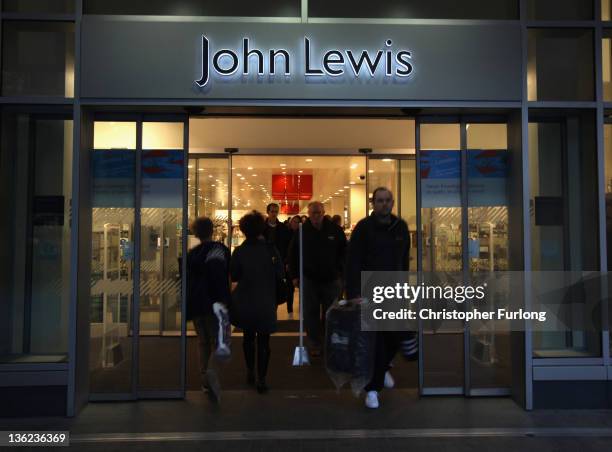 Shoppers take advantage of the post Christmas sales outside the Liverpool branch of John Lewis on December 29, 2011 in Liverpool, England. In spite...