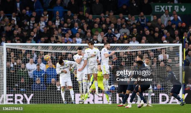 Tyler Roberts, Jack Harrison, Diego Llorente and Stuart Dallas of Leeds United jump in vain as Maxwel Cornet of Burnley scores their sides first goal...