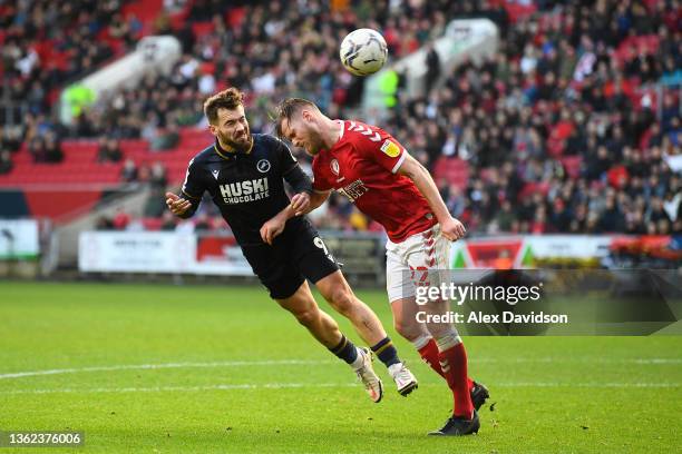 Tom Bradshaw of Millwall challenges for the high ball with Tomas Kalas of Bristol City during the Sky Bet Championship match between Bristol City and...