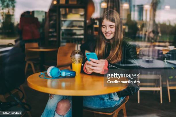teenage girl text messaging - schoolgirl bildbanksfoton och bilder