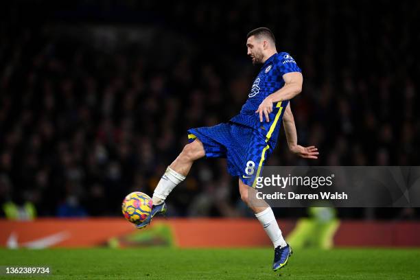 Mateo Kovacic of Chelsea scores their side's first goal during the Premier League match between Chelsea and Liverpool at Stamford Bridge on January...