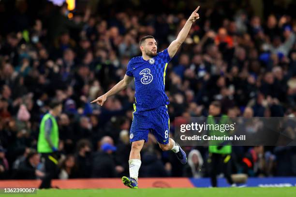Mateo Kovacic of Chelsea celebrates after scoring their side's first goal during the Premier League match between Chelsea and Liverpool at Stamford...