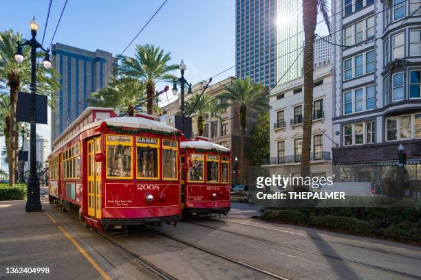 new orleans street cars in canal street - new orleans stock pictures, royalty-free photos & images