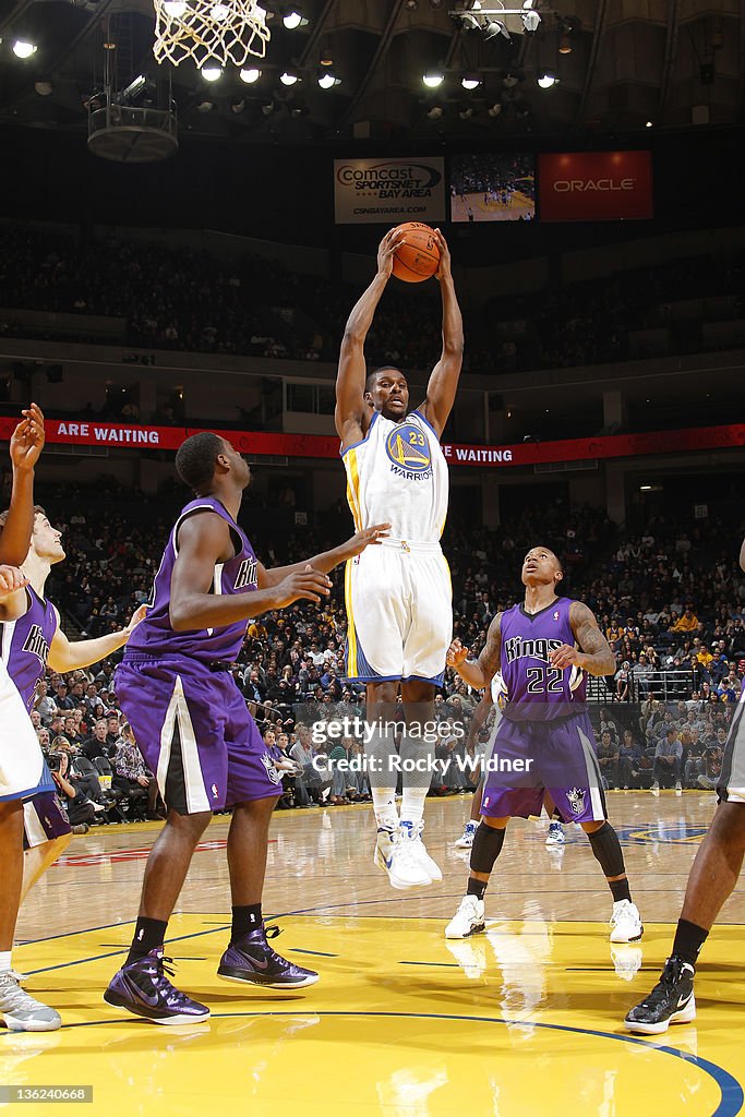 Edwin Ubiles Edwin Ubiles of the Golden State Warriors grabs the rebound against ...