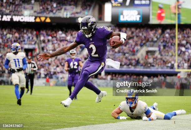 Tyler Huntley of the Baltimore Ravens runs with the ball in the second quarter of the game against the Los Angeles Rams at M&T Bank Stadium on...