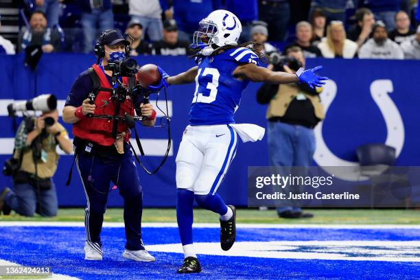 Hilton of the Indianapolis Colts celebrates after catching a pass for a touchdown during the third quarter against the Las Vegas Raiders at Lucas Oil...