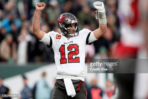 Tom Brady of the Tampa Bay Buccaneers celebrates a successful two-point conversion in the fourth quarter of the game against the New York Jets at...
