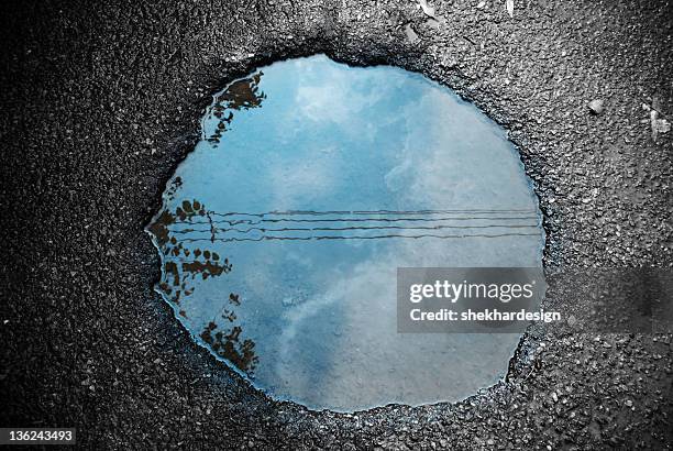 water logging - puddle stock-fotos und bilder