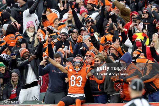 Tyler Boyd of the Cincinnati Bengals celebrates in the crowd after scoring a touchdown against the Kansas City Chiefs at Paul Brown Stadium on...