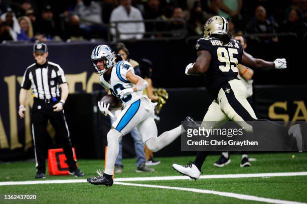 Chuba Hubbard of the Carolina Panthers scores a touchdown in the second quarter of the game against the New Orleans Saints at Caesars Superdome on...