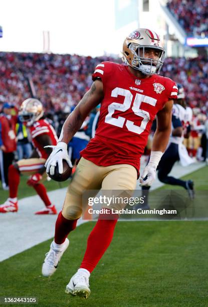 Eli Mitchell of the San Francisco 49ers runs into the endzone for a touchdown in the third quarter of the game against the Houston Texans at Levi's...