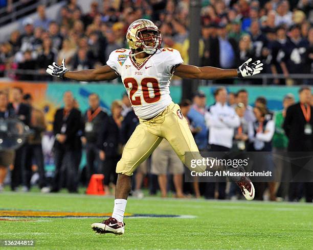 Safety Lamarcus Joyner of the Florida State Seminoles celebrates a first-quarter interception against the Notre Dame Fighting Irish in the Champs...