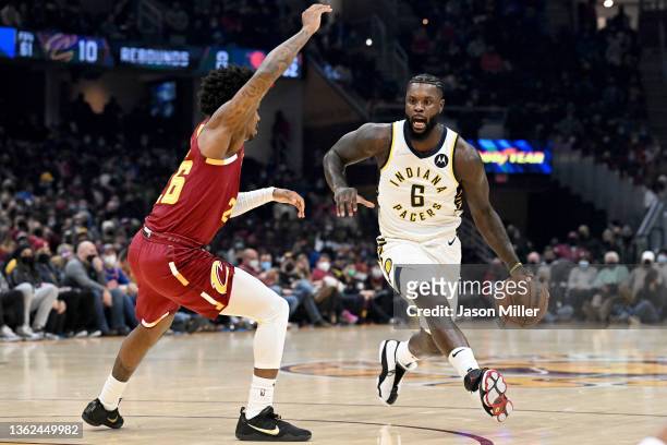 Lance Stephenson of the Indiana Pacers drives to the basket around Brandon Goodwin of the Cleveland Cavaliers during the second quarter at Rocket...