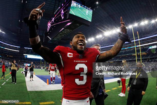 Budda Baker of the Arizona Cardinals celebrates as he runs off the field after defeating the Dallas Cowboys 25-22 at AT&T Stadium on January 02, 2022...