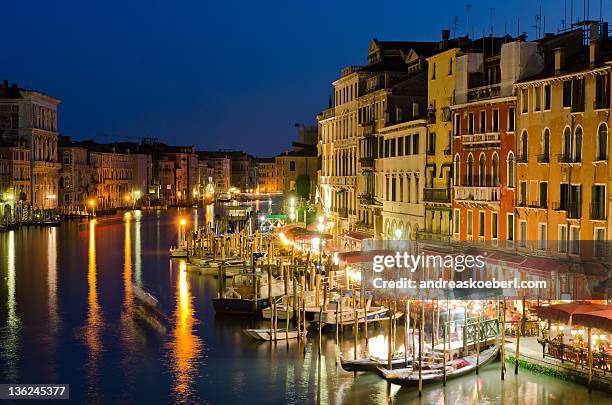 boats at grand canal in venice - andreaskoeberl stock-fotos und bilder