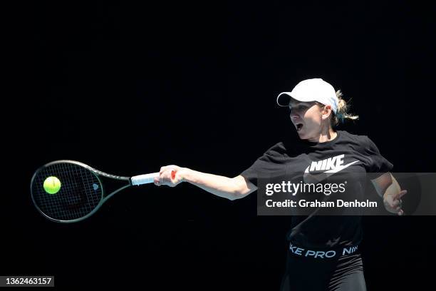 Simona Halep of Romania plays a forehand during a practice session during day one of the Melbourne Summer Set at Melbourne Park on January 03, 2022...