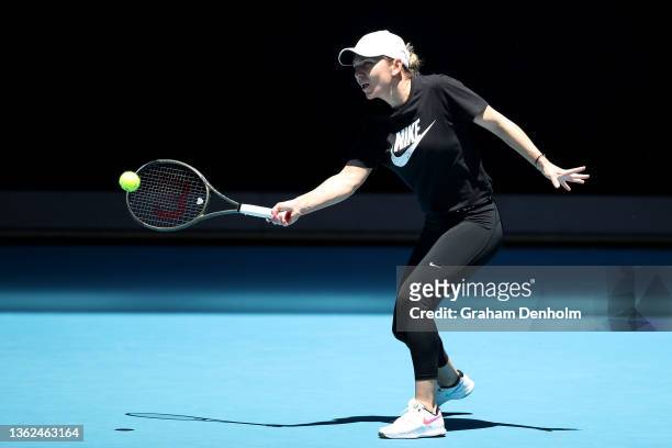 Simona Halep of Romania plays a forehand during a practice session during day one of the Melbourne Summer Set at Melbourne Park on January 03, 2022...