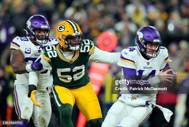 Quarterback Sean Mannion of the Minnesota Vikings is sacked by outside linebacker Rashan Gary of the Green Bay Packers during the 2nd quarter of the...