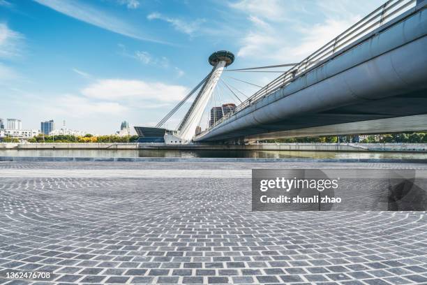 parking lot under the viaduct - river bottom park stock pictures, royalty-free photos & images