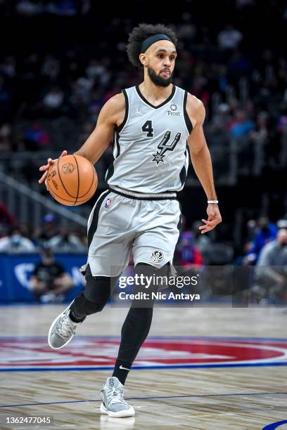 Derrick White of the San Antonio Spurs handles the ball against the Detroit Pistons at Little Caesars Arena on January 01, 2022 in Detroit, Michigan....