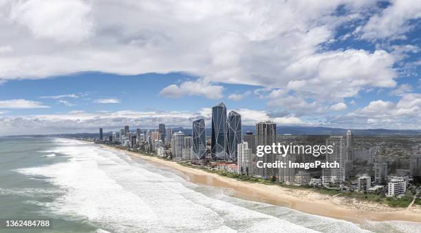 drone eye's view of surfer's paradise, gold coast australia - gold coast australia beach stock pictures, royalty-free photos & images
