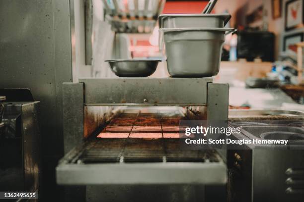 conveyer oven - dirty restaurant kitchen stock pictures, royalty-free photos & images