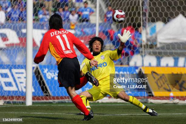 Keiji Tamada of Nagoya Grampus Eight scores his side's first goal during the J.League Yamazaki Nabisco Cup Group D match between Ventforet Kofu and...