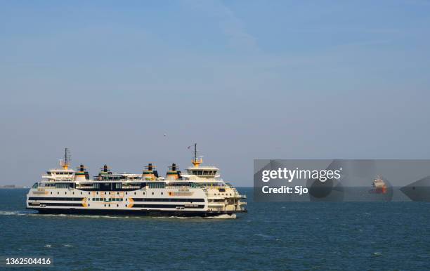 ferry of teso between den helder and texel sailing on the open sea - den helder stock pictures, royalty-free photos & images