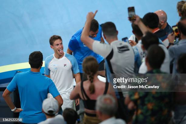 Diego Schwartzman of Argentina celebrates winning his group D match against Stefanos Tsitsipas of Greece during the day three 2022 ATP Cup tie...