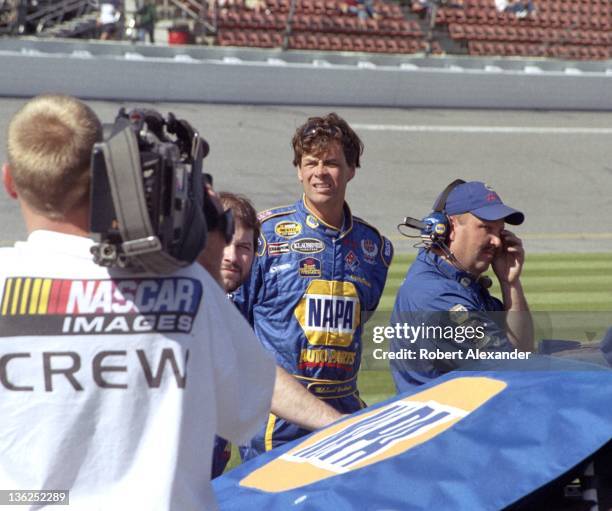 Driver Michael Waltrip waits for his turn to attempt to qualify for the 2005 Daytona 500 at the Daytona International Speedway on February 19, 2005...