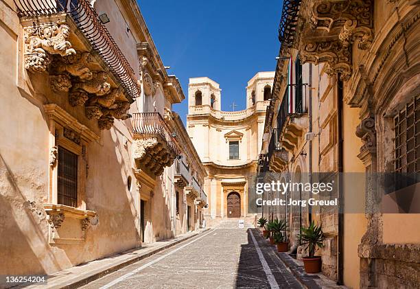 ornate balconies in via corrado nicolaci - sicily stockfoto's en -beelden