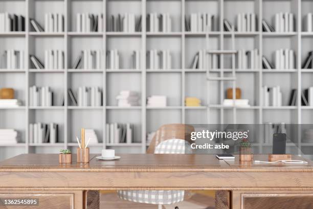 empty wooden desk with libarary as background - library empty stock pictures, royalty-free photos & images