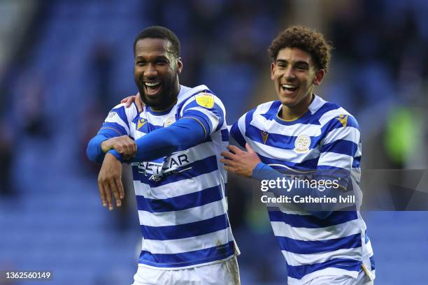 Junior Hoilett of Reading celebrates with teammate Tyrell Ashcroft after scoring their side's first goal during the Sky Bet Championship match...