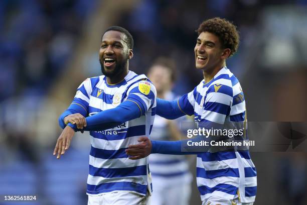 Junior Hoilett of Reading celebrates with teammate Tyrell Ashcroft after scoring their side's first goal during the Sky Bet Championship match...