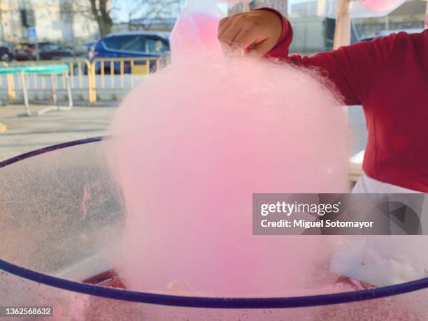 pink cotton candy at an amusement park - cotton candy stock pictures, royalty-free photos & images