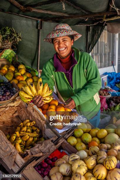 peruvian woman selling fruits in her shop, chivay, peru - indian food bildbanksfoton och bilder