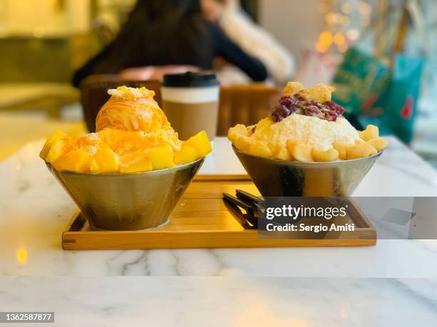 rice cake and mango bingsu (korean shaved ice) - mango shaved ice stock pictures, royalty-free photos & images