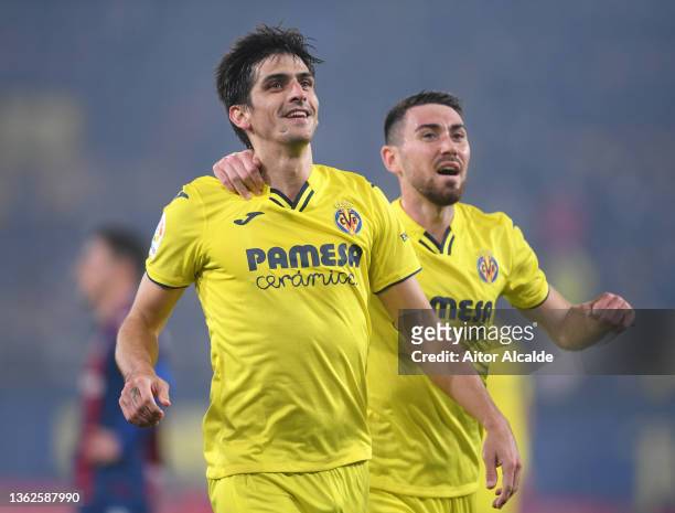 Gerard Moreno of Villarreal CF celebrates their side's third goal with teammate Moi Gomez during the LaLiga Santander match between Villarreal CF and...