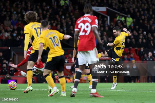 Joao Moutinho of Wolverhampton Wanderers scores their side's first goal during the Premier League match between Manchester United and Wolverhampton...