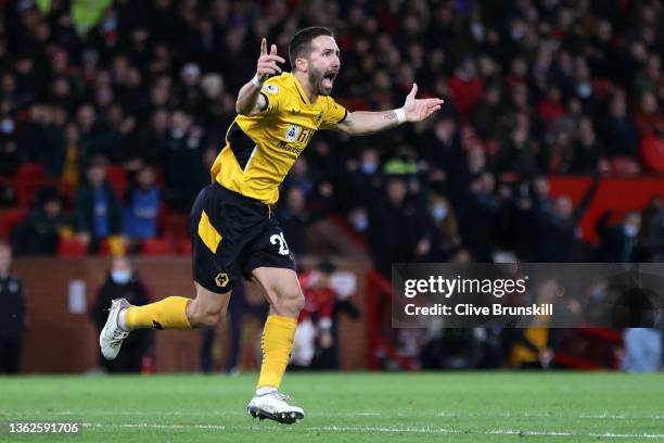 Joao Moutinho of Wolverhampton Wanderers celebrates after scoring their side's first goal during the Premier League match between Manchester United...