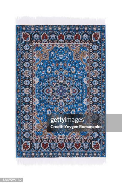 blue carpet isolated on white background - gemusterter teppich stock-fotos und bilder