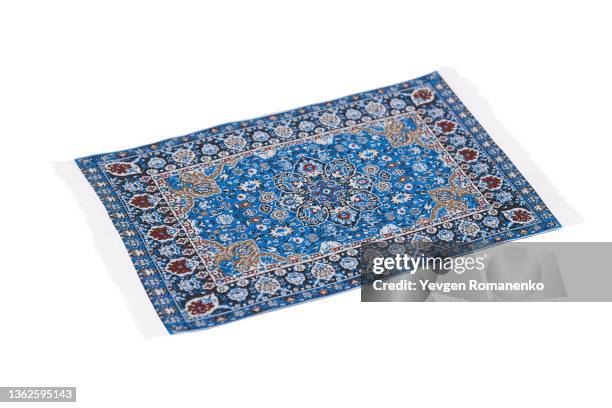 blue carpet isolated on white background - dekorativ matta bildbanksfoton och bilder