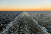 Water wake of the ferry left on sea surface