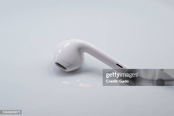 Apple EarPods wired headphones on white background, Lafayette, California, December 12, 2021. Photo courtesy Tech Trends.