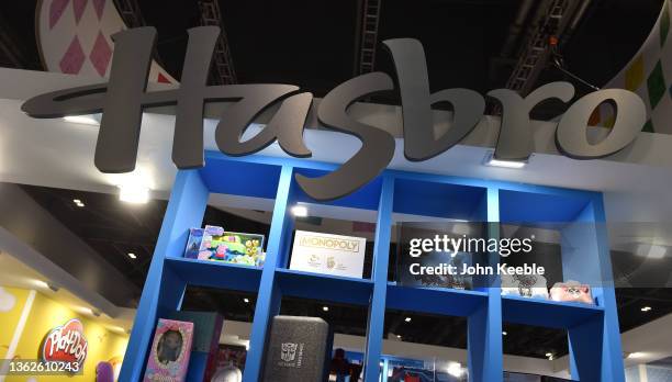 Games sit under the Hasbro logo during Brand Licensing Europe at ExCel on November 18, 2021 in London, England. Brand Licensing Europe is dedicated...