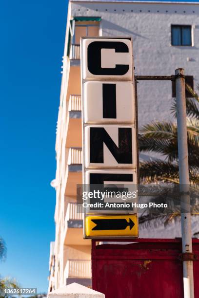vintage style sign indicating the address of a cinema. - old advertisement stock pictures, royalty-free photos & images