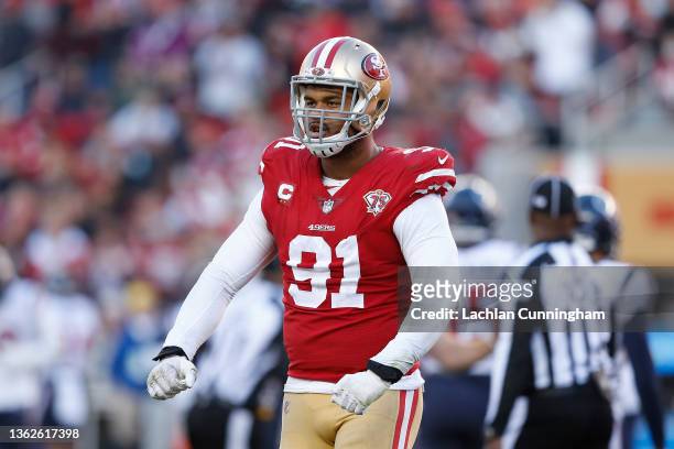 Arik Armstead of the San Francisco 49ers reacts after a defensive play in the fourth quarter against the Houston Texans at Levi's Stadium on January...