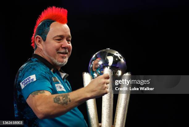 Peter Wright of Scotland celebrates the win during the Finals against Michael Smith of England during Day Sixteen of The William Hill World Darts...