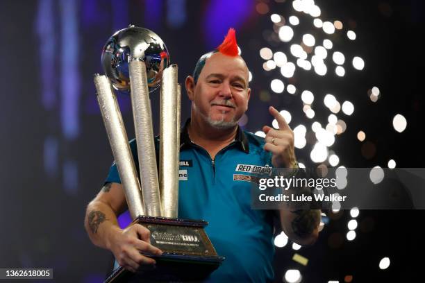 Peter Wright of Scotland celebrates the win during the Finals against Michael Smith of England during Day Sixteen of The William Hill World Darts...